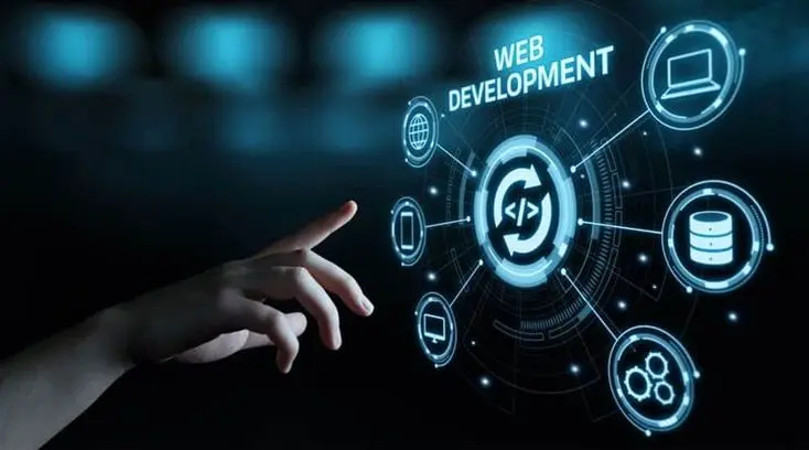 Freelance digital marketer in Qatar A human hand reaches out towards a glowing blue holographic diagram displaying "WEB DEVELOPMENT" at the top, with a central icon of code brackets and arrows. Connected icons represent various web development elements: a globe, mobile phone, tablet, desktop computer, database server and gears.